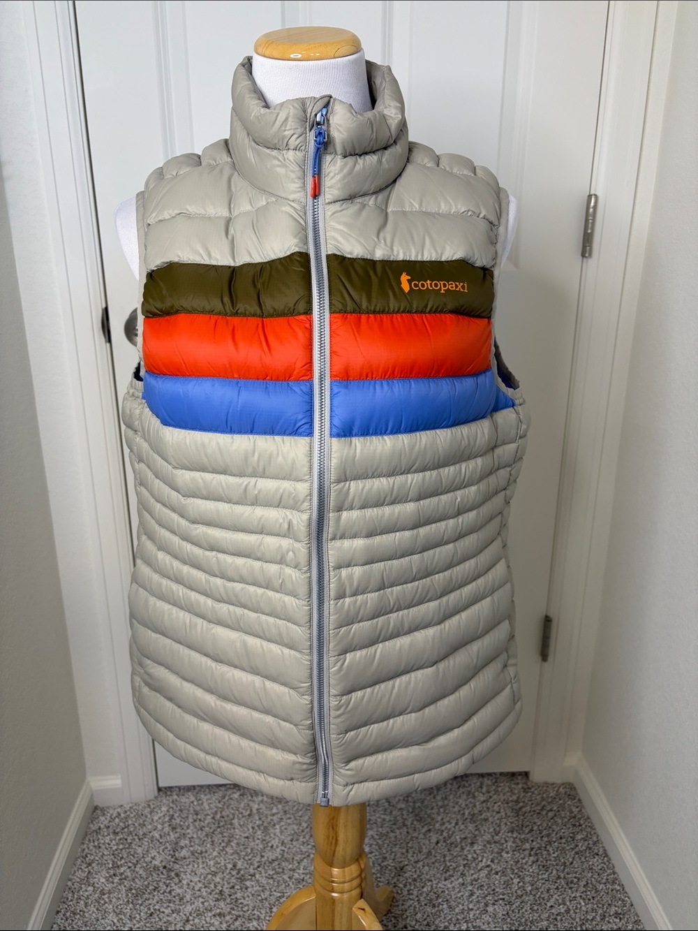 cotopaxi Gray Down Vest with Brown, Red & Blue Stripes